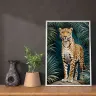 Tropical jungle leopard standing alert among palm leaves and forest shadows