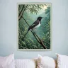 Contemporary interior featuring the TAMAJAD “Oriental Magpie-Robin” tropical bird artwork displayed as premium vertical wall art.