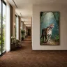 Clouded leopard rainforest artwork displayed in a luxury hotel corridor, premium XXL wildlife wall art